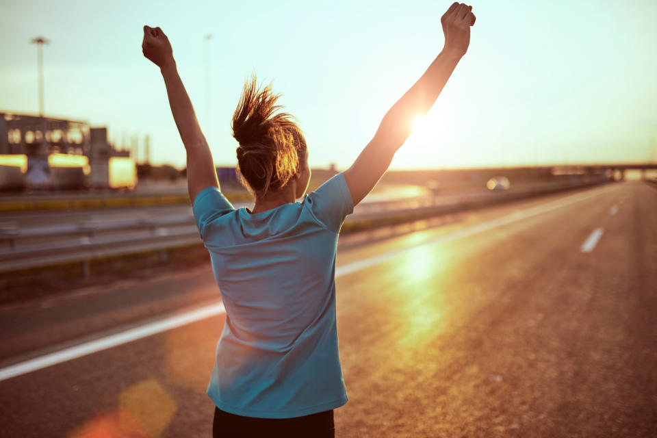 A woman feels good after exercising. (Getty Images)